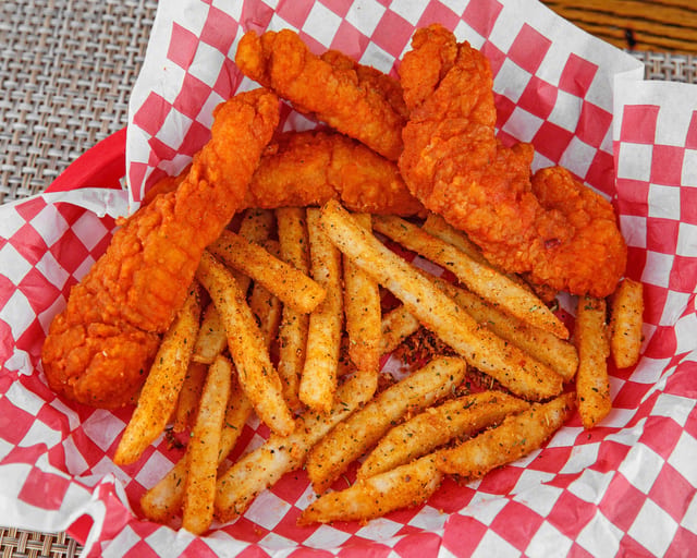 Fried Buffalo Chicken Tenders with Fries.