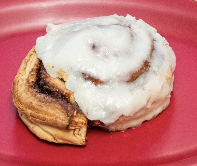 Large Cinnamon Roll with Fresh Icing.